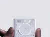 "Nothing Npod " 重新塑造了 Apple 的经典 iPod Shuffle，赋予了它 "Nothing" 的独特设计精髓。